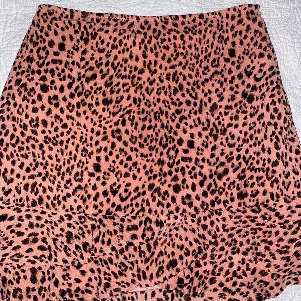 Pink and black cheetah print mini skirt